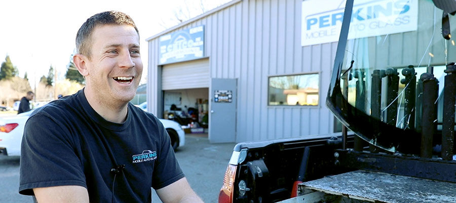 Technician with Mobile Auto Glass Repair Vehicle