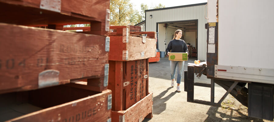 Produce farmer with refrigerated delivery truck